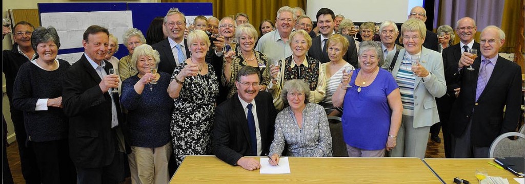 Some of committee and friends at the official lease signing