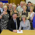 Some of committee and friends at the official lease signing